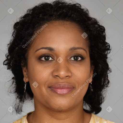 Joyful black young-adult female with medium  brown hair and brown eyes