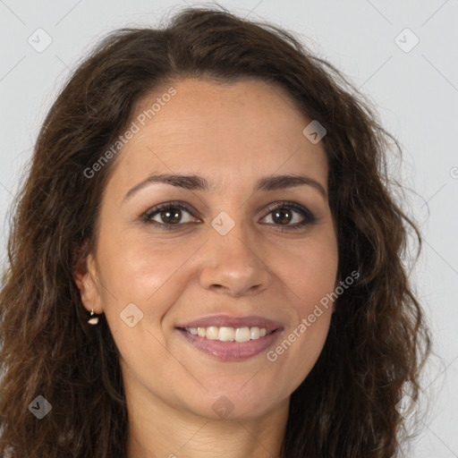 Joyful white young-adult female with long  brown hair and brown eyes