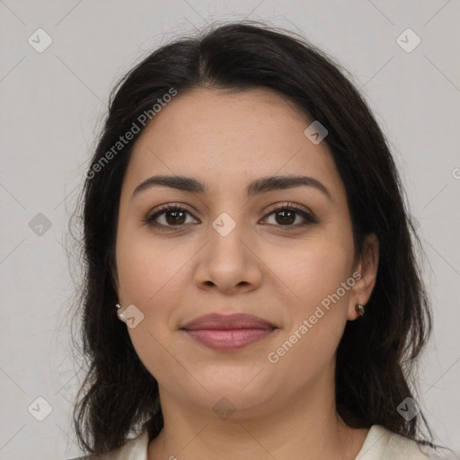 Joyful latino young-adult female with medium  brown hair and brown eyes