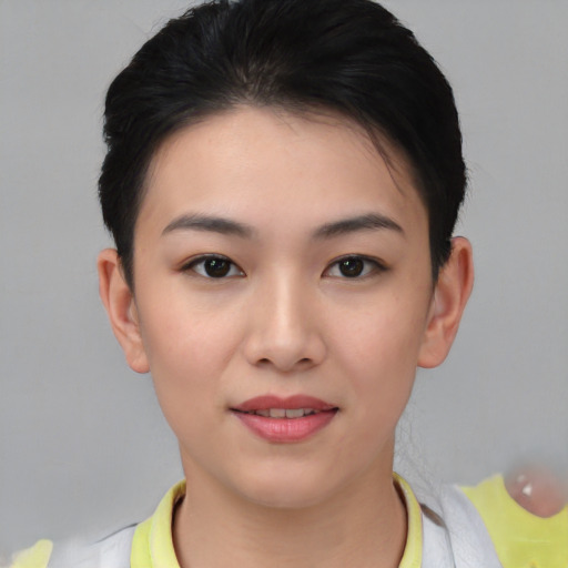 Joyful white young-adult female with short  black hair and brown eyes