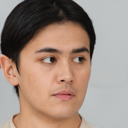 Neutral asian young-adult male with short  brown hair and brown eyes