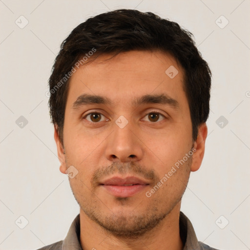 Neutral white young-adult male with short  brown hair and brown eyes
