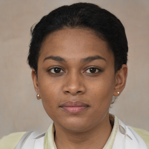 Neutral black young-adult female with short  brown hair and brown eyes
