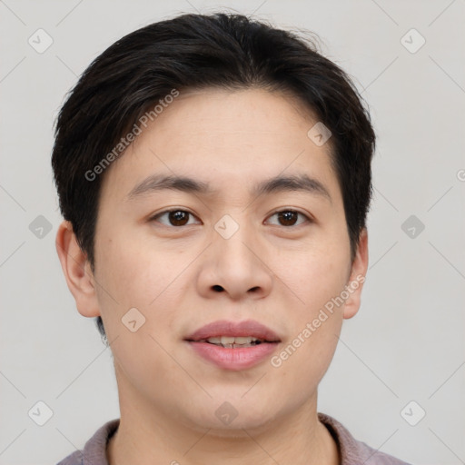 Joyful asian young-adult male with short  brown hair and brown eyes