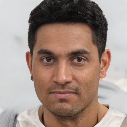 Neutral white young-adult male with short  black hair and brown eyes