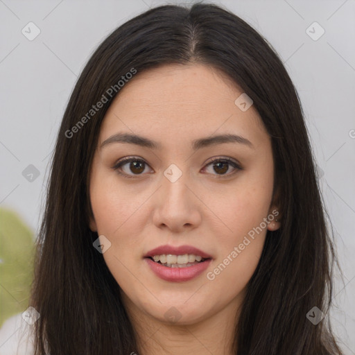 Joyful asian young-adult female with long  brown hair and brown eyes