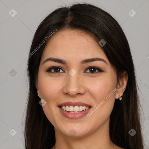 Joyful white young-adult female with long  brown hair and brown eyes