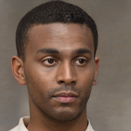 Neutral black young-adult male with short  brown hair and brown eyes