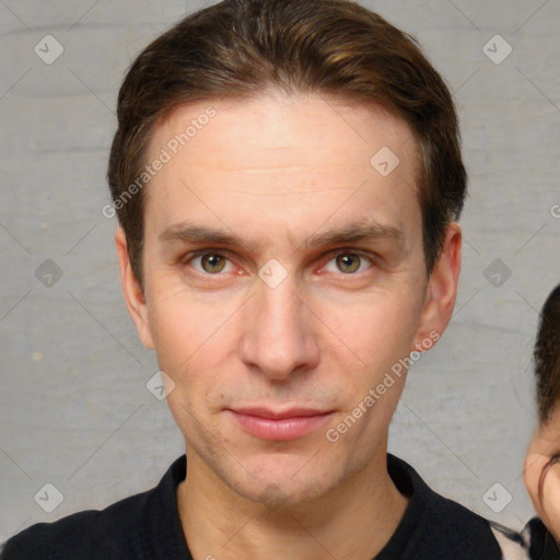 Joyful white young-adult male with short  brown hair and brown eyes