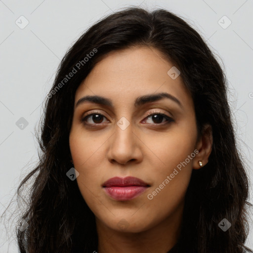 Joyful latino young-adult female with long  brown hair and brown eyes