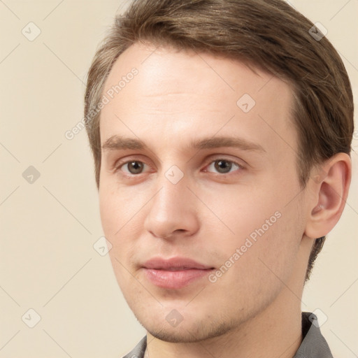 Neutral white young-adult male with short  brown hair and brown eyes