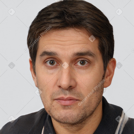 Neutral white adult male with short  brown hair and brown eyes