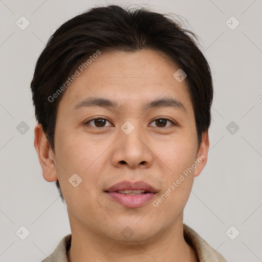 Joyful asian young-adult male with short  brown hair and brown eyes