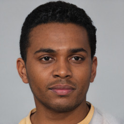 Neutral latino young-adult male with short  brown hair and brown eyes