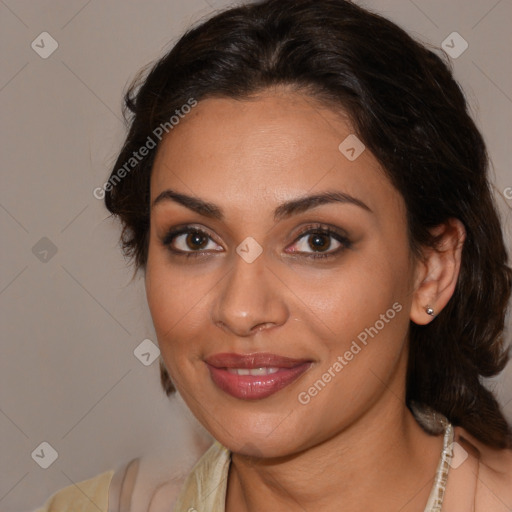 Joyful latino young-adult female with medium  brown hair and brown eyes