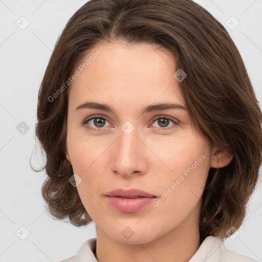 Neutral white young-adult female with medium  brown hair and brown eyes