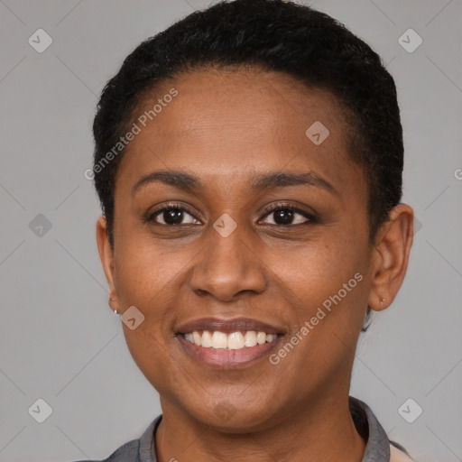 Joyful latino young-adult female with short  black hair and brown eyes