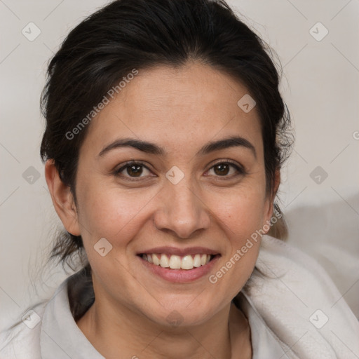 Joyful white adult female with medium  brown hair and brown eyes