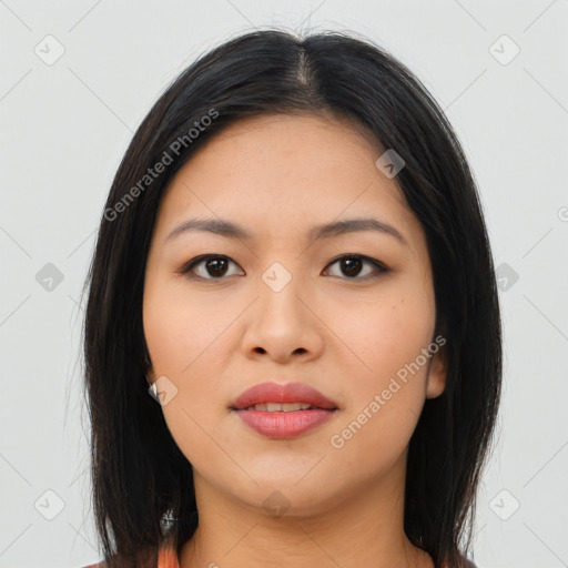 Joyful asian young-adult female with long  black hair and brown eyes