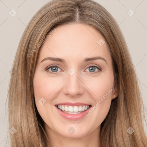 Joyful white young-adult female with long  brown hair and brown eyes