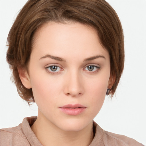 Neutral white young-adult female with medium  brown hair and grey eyes