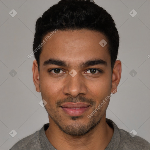 Joyful latino young-adult male with short  black hair and brown eyes