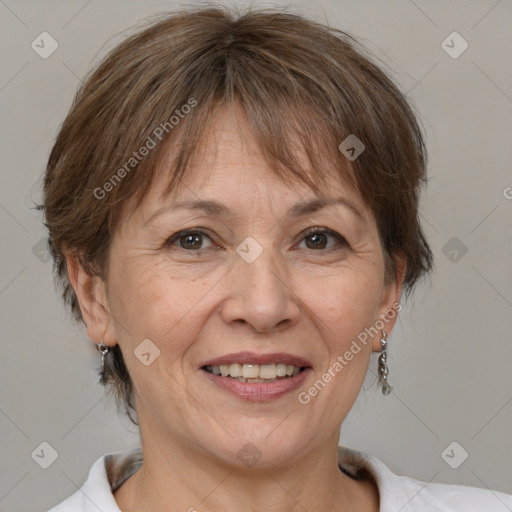 Joyful white adult female with medium  brown hair and brown eyes