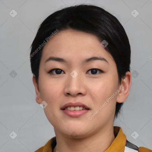 Joyful asian young-adult female with medium  black hair and brown eyes