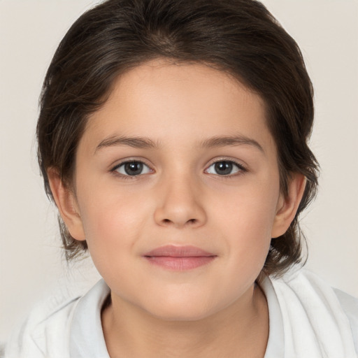 Joyful white child female with medium  brown hair and brown eyes