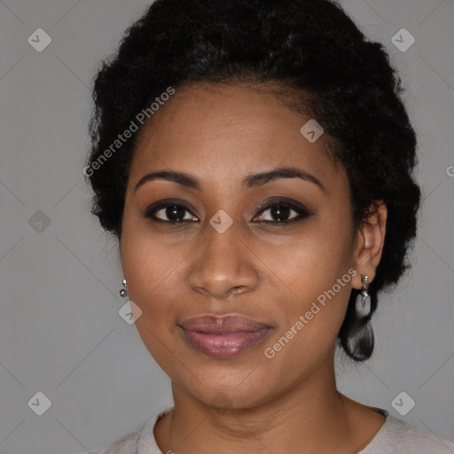 Joyful black young-adult female with medium  black hair and brown eyes