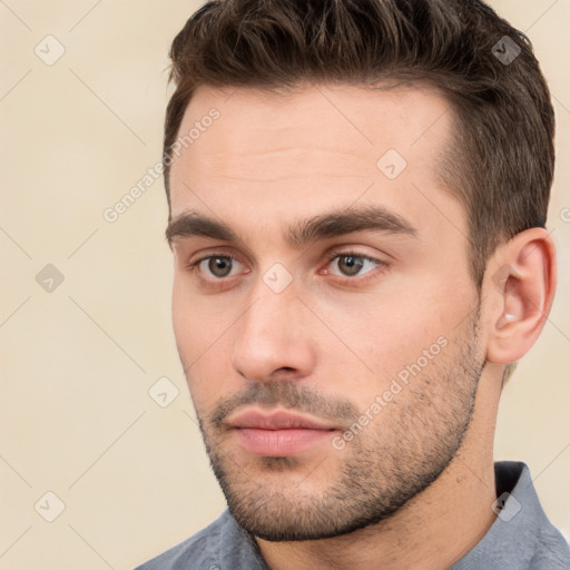 Neutral white young-adult male with short  brown hair and brown eyes