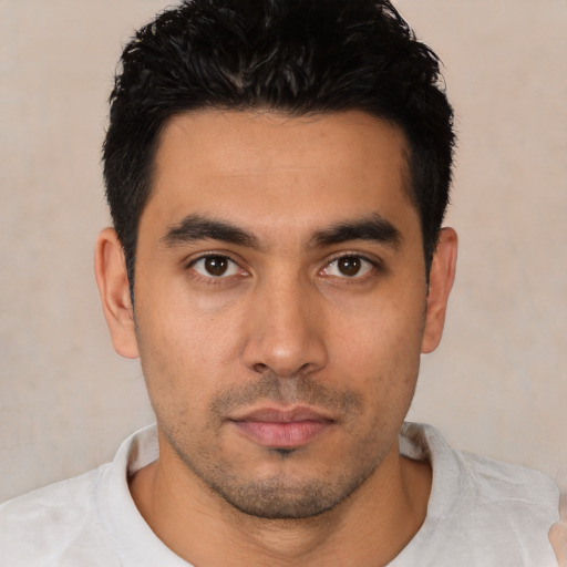 Neutral latino young-adult male with short  black hair and brown eyes