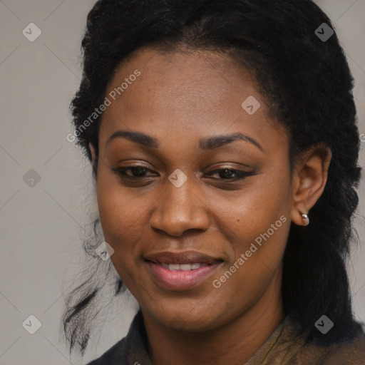 Joyful black young-adult female with long  black hair and brown eyes