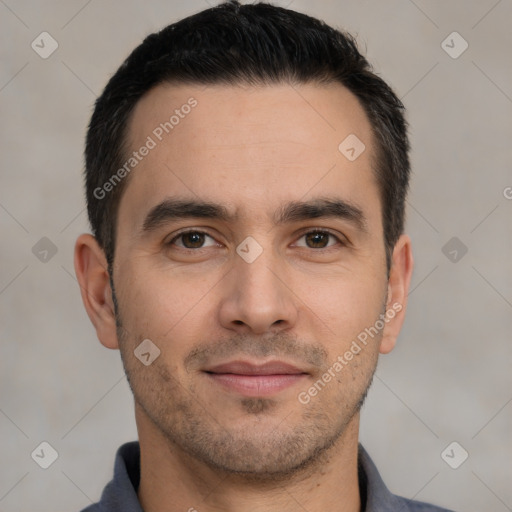 Joyful white young-adult male with short  black hair and brown eyes