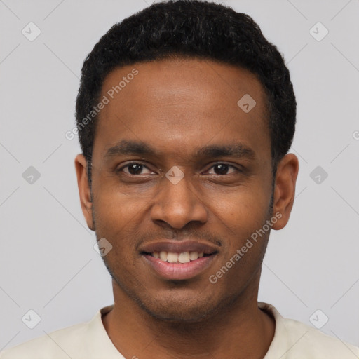 Joyful black young-adult male with short  black hair and brown eyes