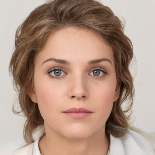 Neutral white young-adult female with medium  brown hair and grey eyes