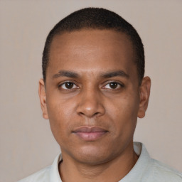 Neutral black young-adult male with short  brown hair and brown eyes
