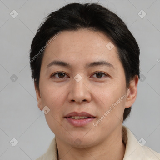 Joyful white adult female with short  brown hair and brown eyes