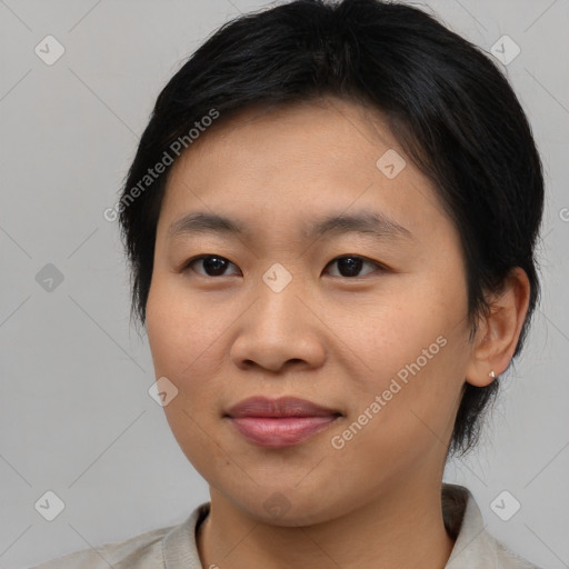 Joyful asian young-adult female with medium  brown hair and brown eyes