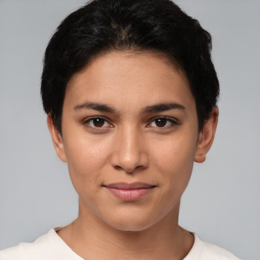 Joyful white young-adult female with short  black hair and brown eyes