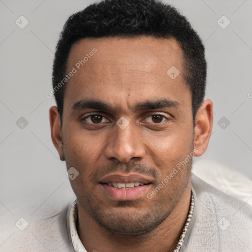 Joyful white young-adult male with short  black hair and brown eyes