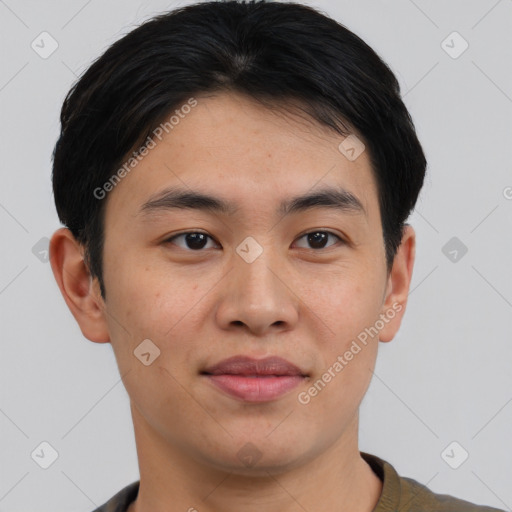 Joyful asian young-adult male with short  brown hair and brown eyes