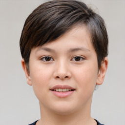 Joyful white child female with short  brown hair and brown eyes