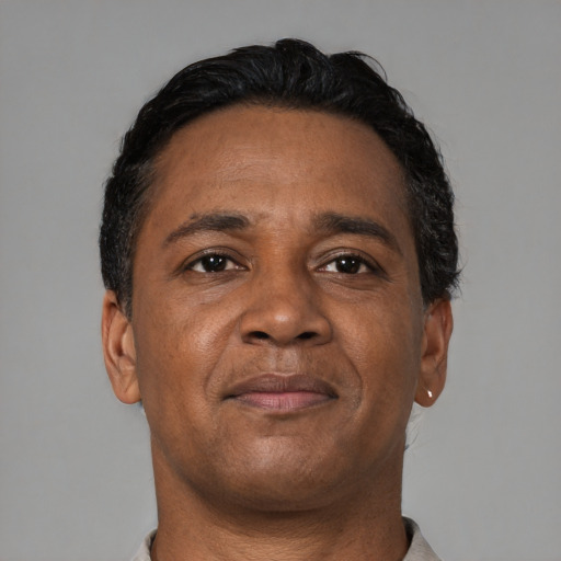 Neutral black adult male with short  black hair and brown eyes
