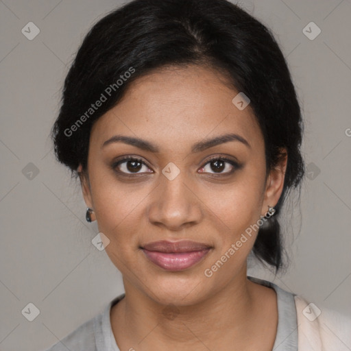 Joyful black young-adult female with medium  black hair and brown eyes