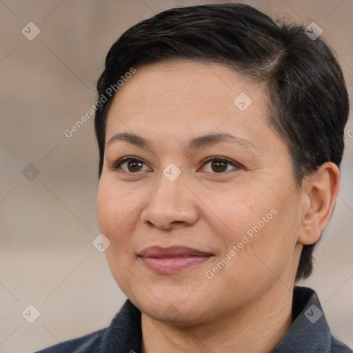 Joyful white adult female with short  brown hair and brown eyes