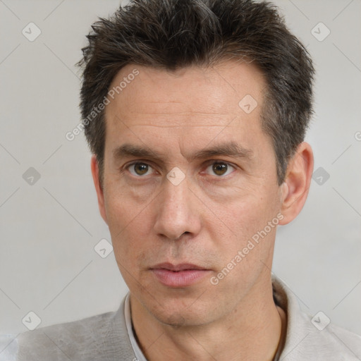 Neutral white adult male with short  brown hair and brown eyes