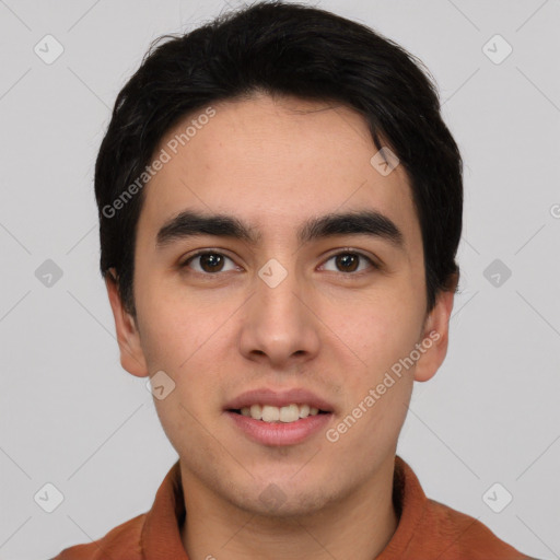 Joyful white young-adult male with short  black hair and brown eyes