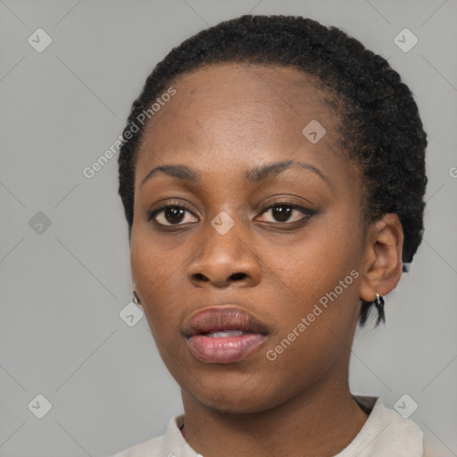 Neutral black young-adult female with short  black hair and brown eyes