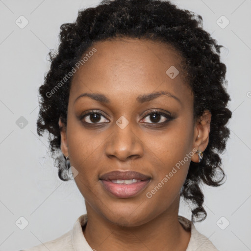 Joyful black young-adult female with medium  black hair and brown eyes